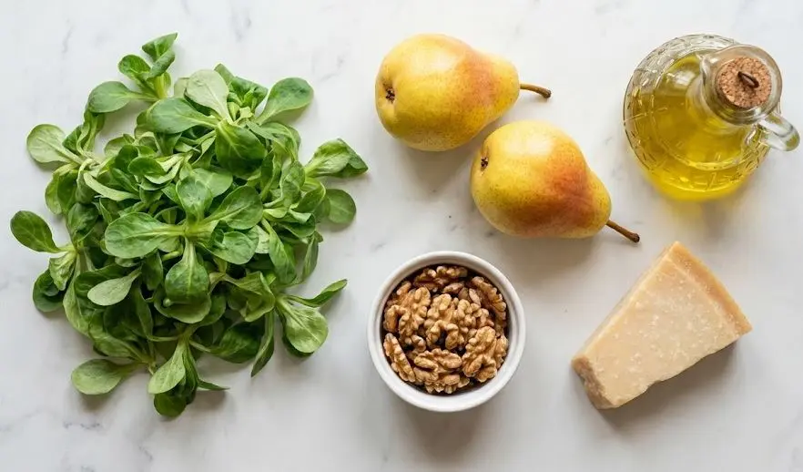 Ingredienti dell'insalata di valeriana, pere e noci